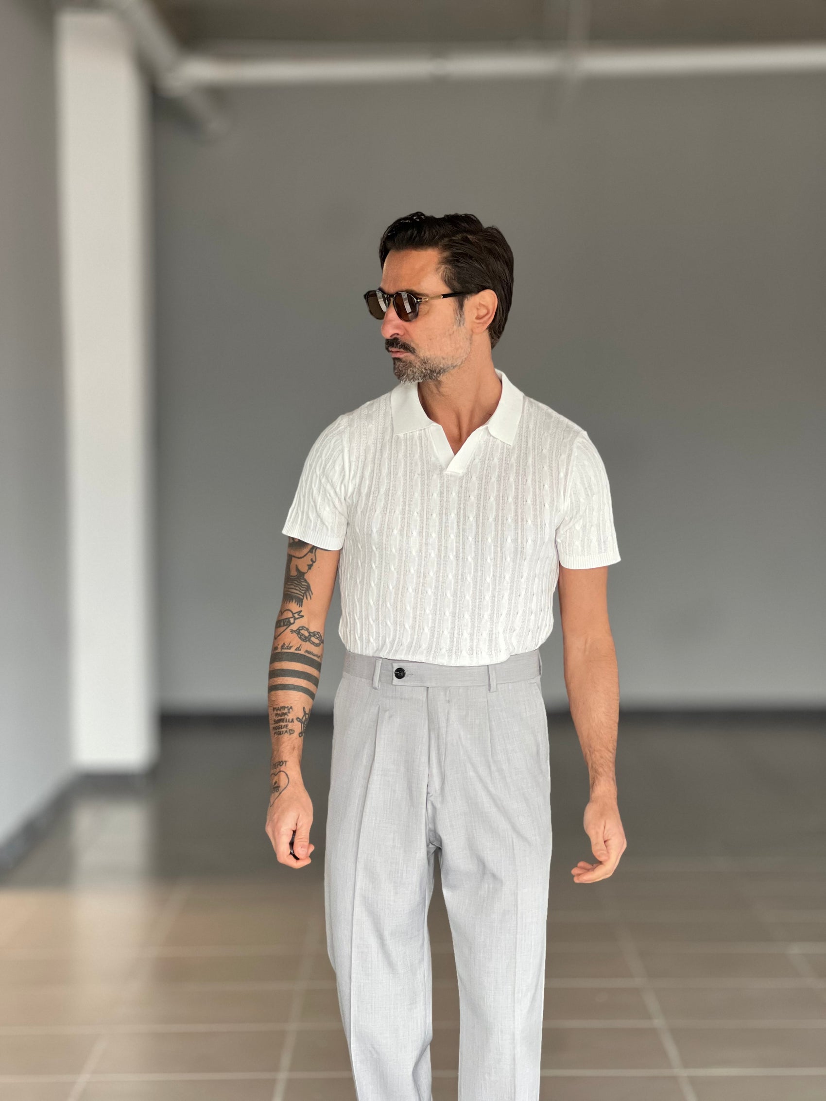 POLO BIANCA OPERATA COLLO AMERICANO