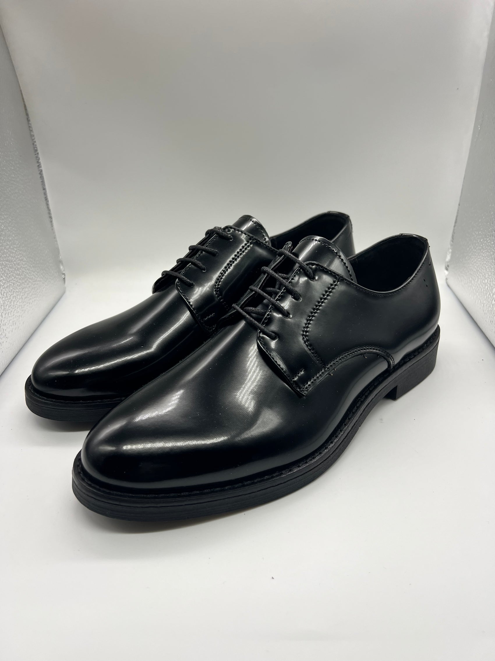 STRINGATA NERA SEMILUCIDA FONDO GOMMA