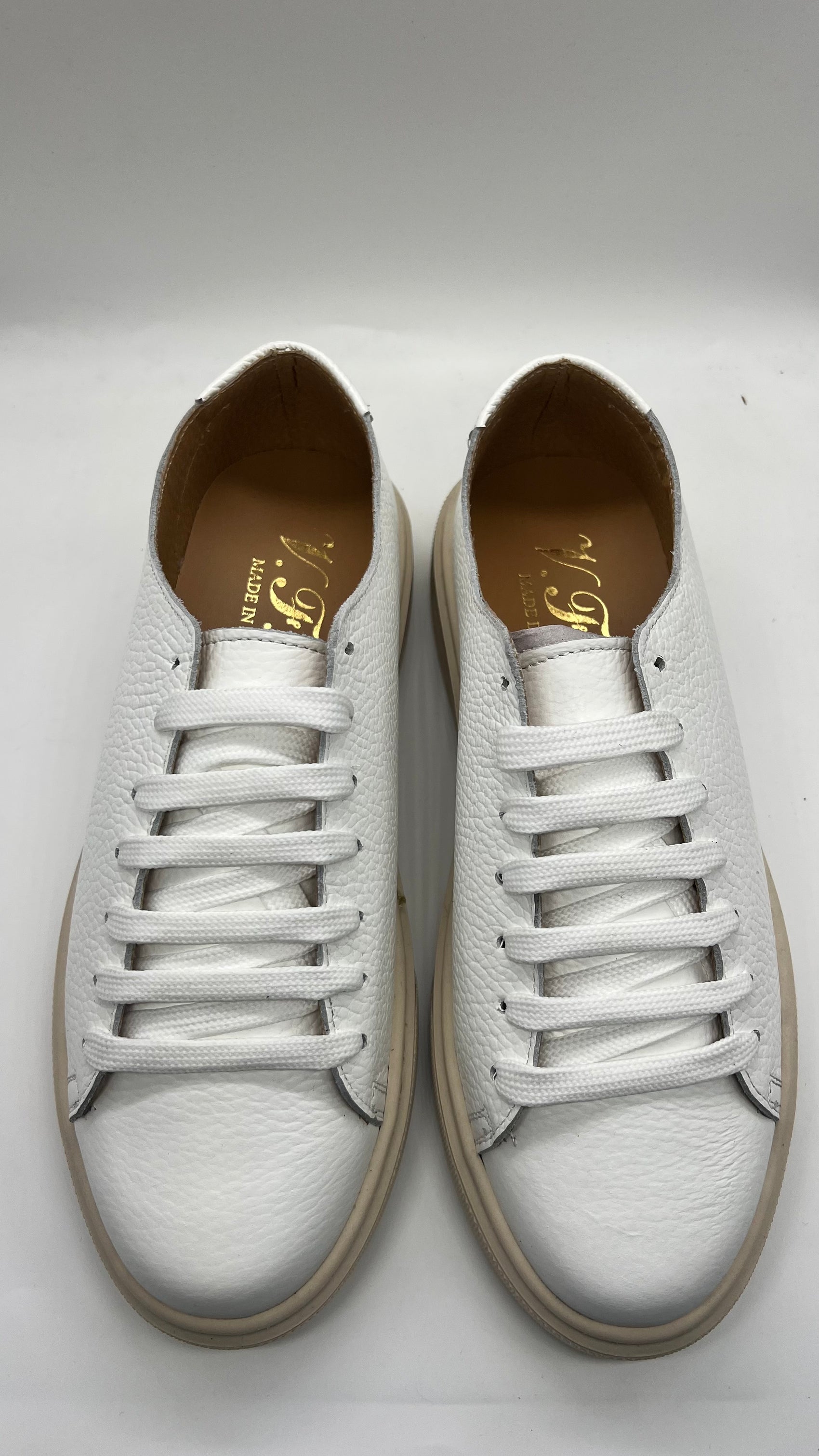 SNEAKER BIANCA  BOTTOLATA TAGLIO VIVO