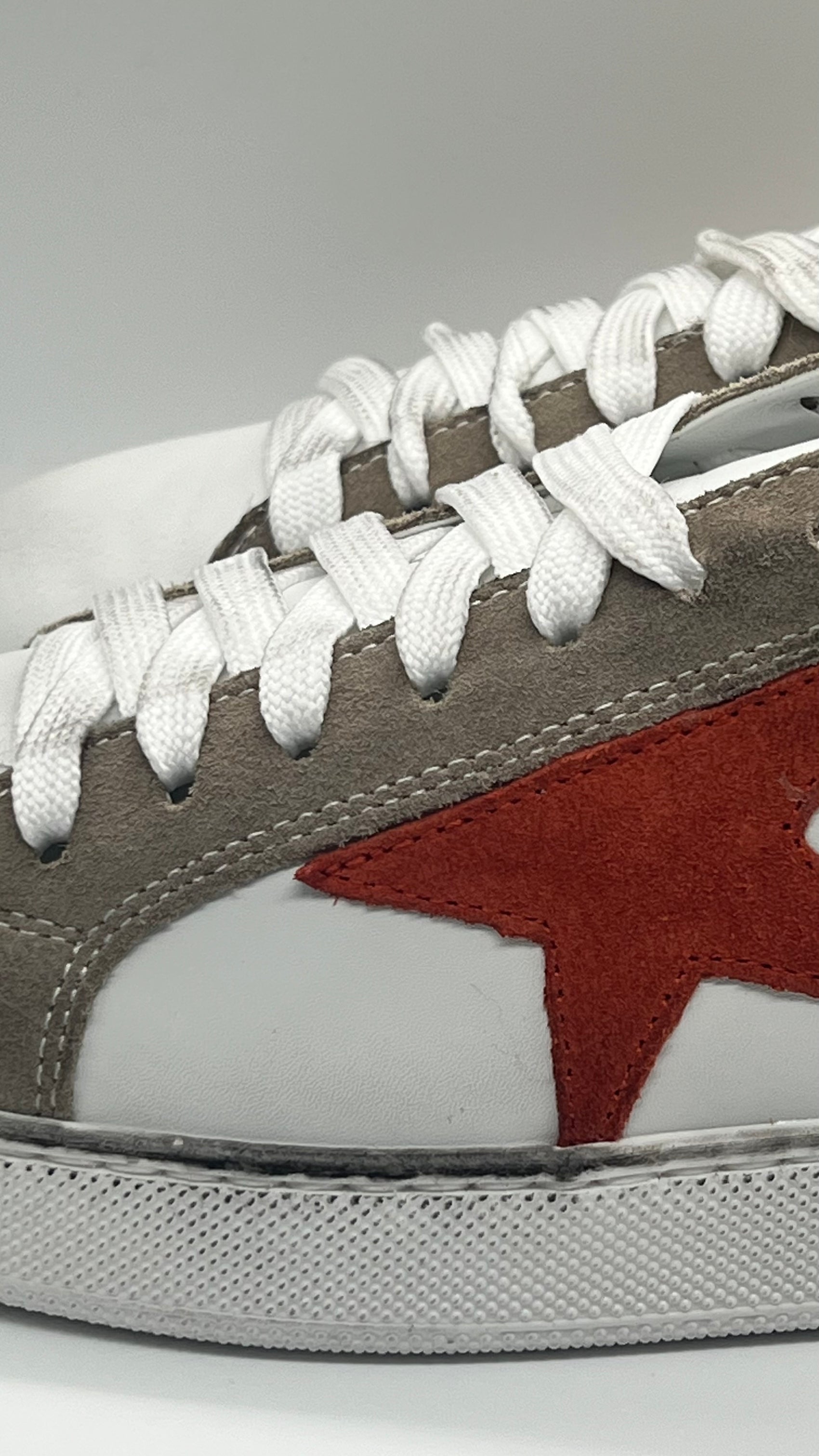 LEATHER AND SUEDE SNEAKERS WITH YELLOW CAP