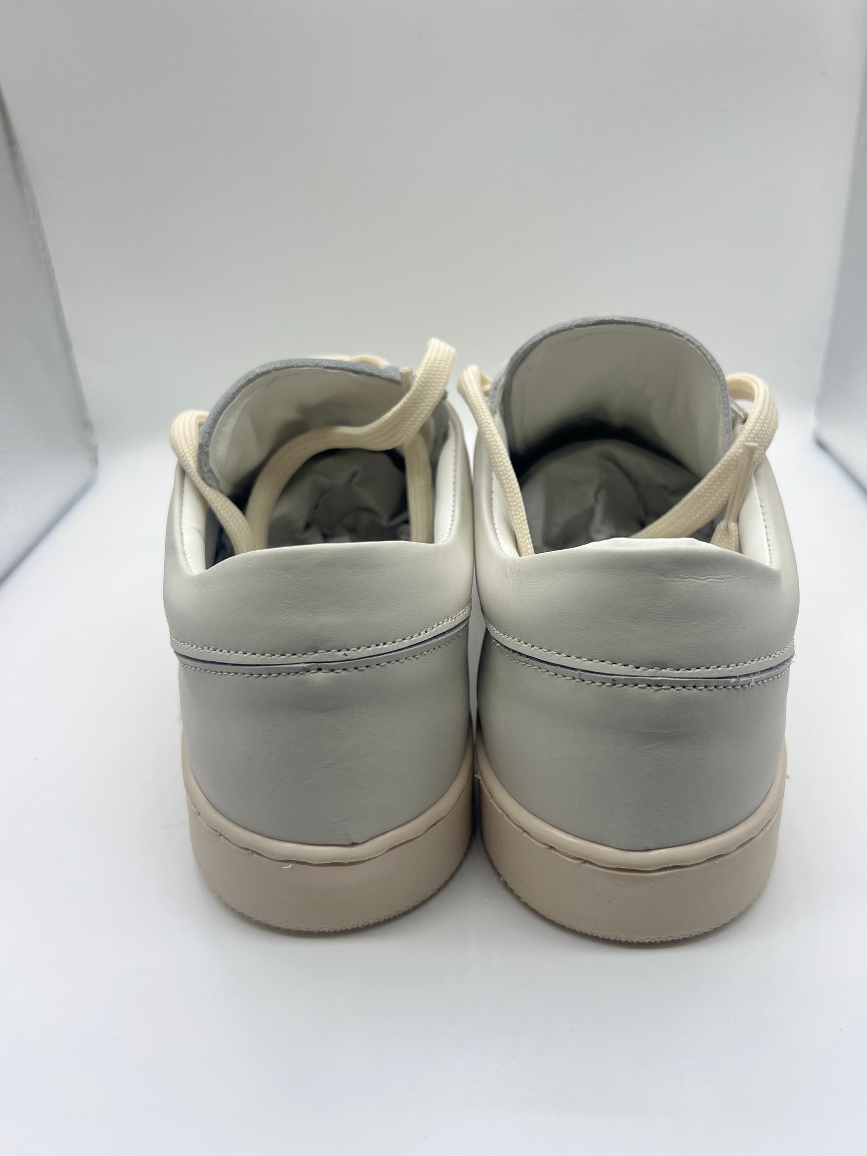 SNEAKER BIANCA SPORCATA BOTTOLATA TRAFORATA